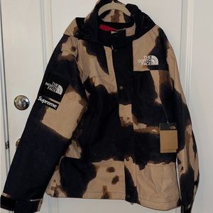 Supreme The North Face Bleached Denim Print
Mountain Jacket